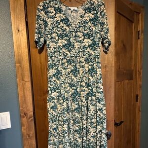 Cute maxi dress. Tiered hem. Size LP. Elastic waste. Tags removed but not worn.